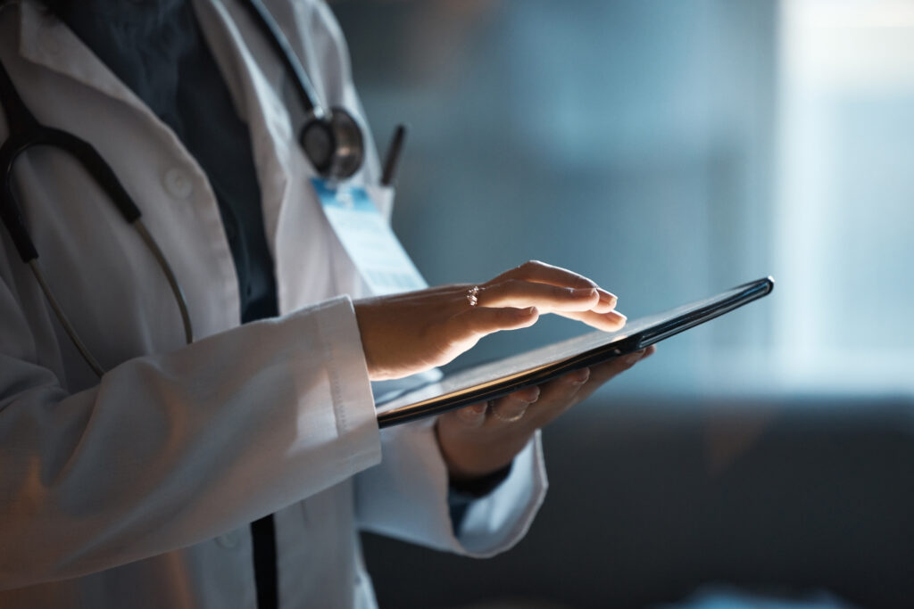 Telehealth, digital tablet and doctor hands for hospital innovation, software management and result